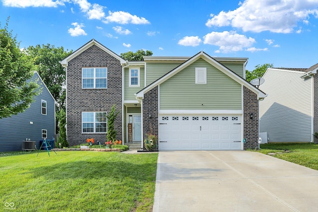 10902 Jimmy Lake Dr, Indianapolis, IN 46239 - traditional home featuring brick siding, a front yard, driveway, and an attached garage