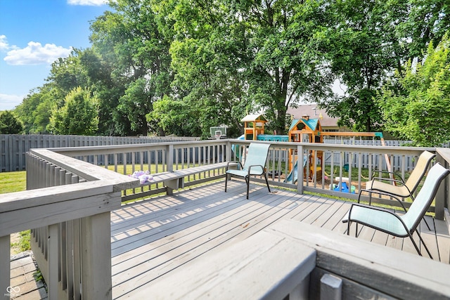 10902 Jimmy Lake Dr, Indianapolis, IN 46239 - wooden deck featuring a playground and a fenced backyard