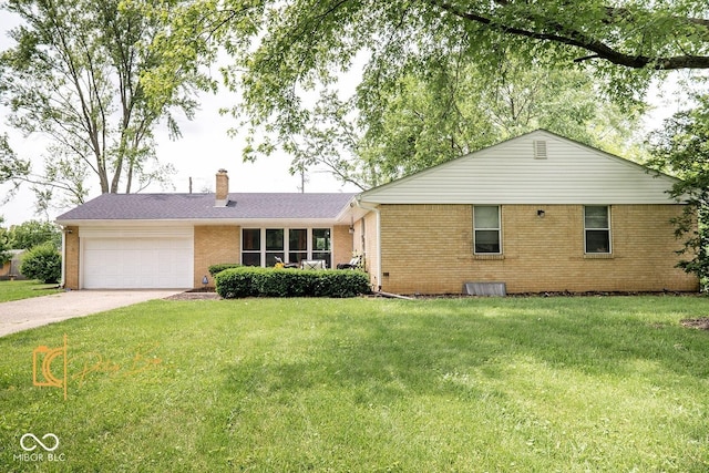 6180 Winnpeny Ln, Indianapolis, IN 46220 - ranch-style house featuring brick siding, an attached garage, driveway, a chimney, and a front yard