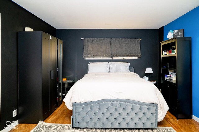 6180 Winnpeny Ln, Indianapolis, IN 46220 - bedroom featuring light wood finished floors and a closet