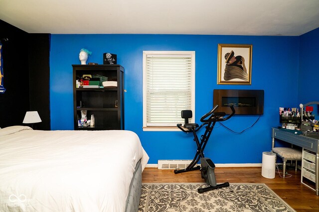 6180 Winnpeny Ln, Indianapolis, IN 46220 - bedroom with wood finished floors and baseboards