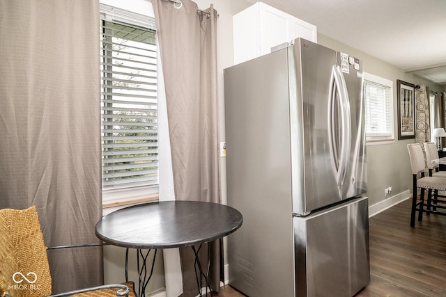 6180 Winnpeny Ln, Indianapolis, IN 46220 - kitchen with freestanding refrigerator, dark wood-style flooring, white cabinetry, and baseboards