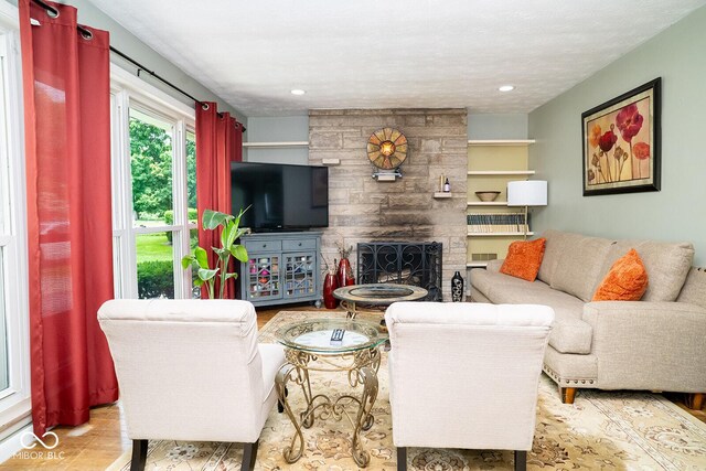 6180 Winnpeny Ln, Indianapolis, IN 46220 - living area featuring a fireplace and recessed lighting