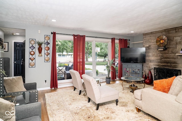 6180 Winnpeny Ln, Indianapolis, IN 46220 - living room with wood finished floors, baseboards, and recessed lighting