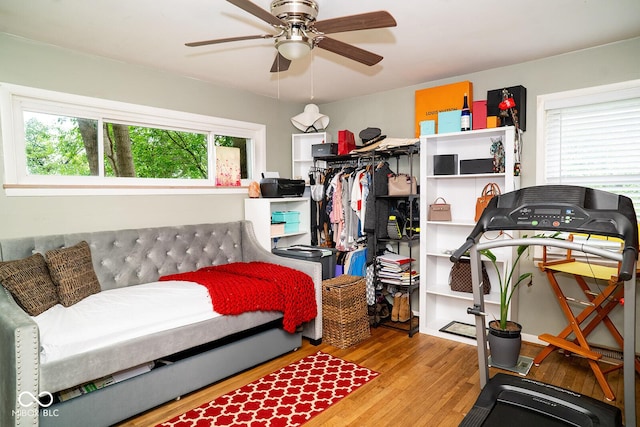 6180 Winnpeny Ln, Indianapolis, IN 46220 - bedroom with wood finished floors and ceiling fan