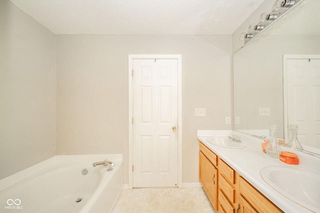 1139 Maple Stream Dr, Indianapolis, IN 46217 - full bathroom featuring double vanity, tile patterned floors, a garden tub, and baseboards