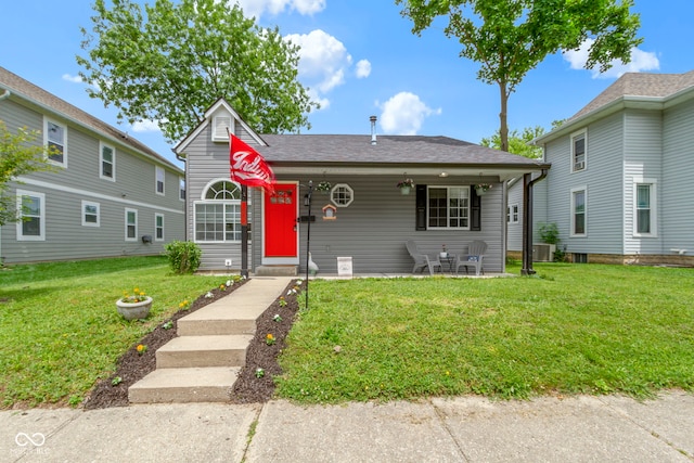 422 W Broadway St, Greenwood, IN 46142 - view of front facade with a front lawn and central AC