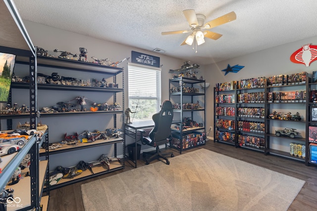 6608 Sonesta Dr, Indianapolis, IN 46217 - office space with a ceiling fan, a textured ceiling, and wood finished floors