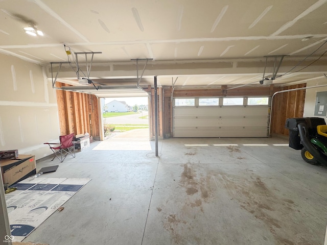 2358 S Stonehill Way, New Palestine, IN 46163 - garage with a garage door opener and electric panel