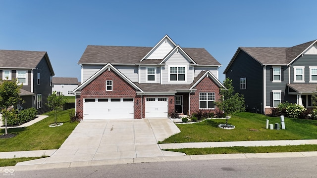 2358 S Stonehill Way, New Palestine, IN 46163 - view of front of property with brick siding, concrete driveway, an attached garage, and a front lawn