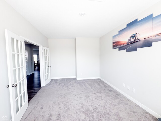 2358 S Stonehill Way, New Palestine, IN 46163 - carpeted spare room featuring french doors and baseboards