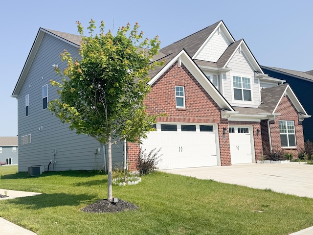 2358 S Stonehill Way, New Palestine, IN 46163 - craftsman-style home with driveway, a front lawn, brick siding, and a garage