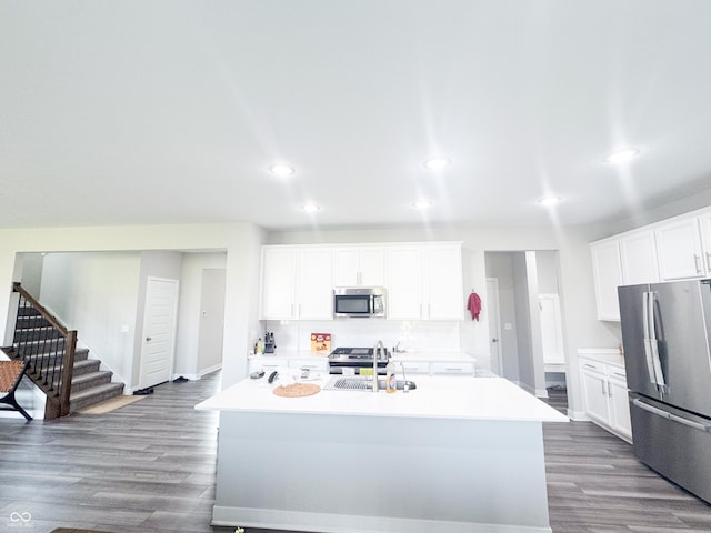 2358 S Stonehill Way, New Palestine, IN 46163 - kitchen with stainless steel appliances, dark wood finished floors, backsplash, recessed lighting, and light countertops