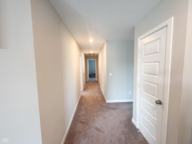 2358 S Stonehill Way, New Palestine, IN 46163 - hall with carpet flooring and a textured ceiling