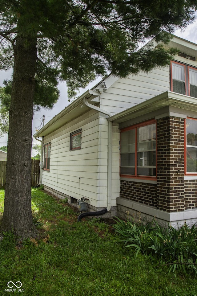 1115 N Kealing Ave, Indianapolis, IN 46201 - view of side of home featuring brick siding