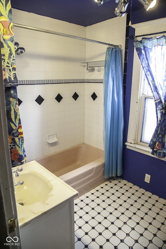1115 N Kealing Ave, Indianapolis, IN 46201 - full bath featuring shower / bath combination with curtain, healthy amount of natural light, and vanity
