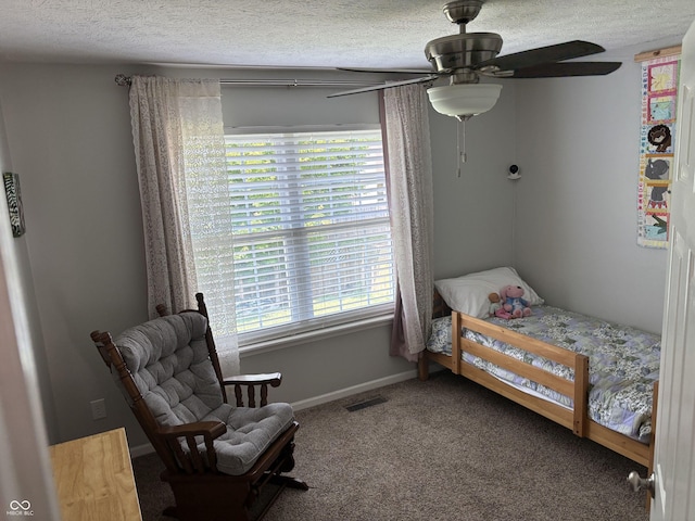8926 Durban Ct, Indianapolis, IN 46234 - bedroom with carpet floors, a textured ceiling, baseboards, and a ceiling fan