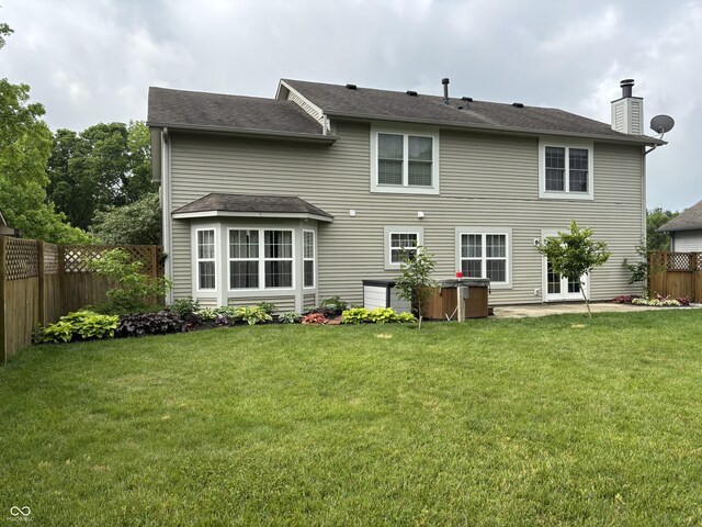8926 Durban Ct, Indianapolis, IN 46234 - rear view of house with a chimney, roof with shingles, and french doors
