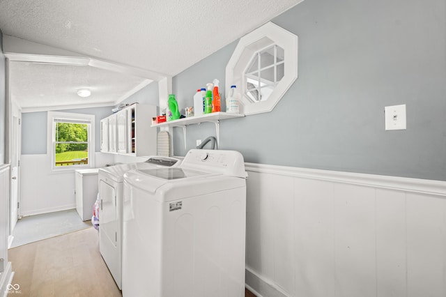 379 N Marion St, Morgantown, IN 46160 - washroom with washing machine and clothes dryer, a textured ceiling, and wainscoting