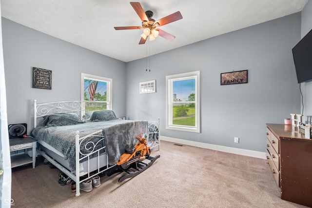379 N Marion St, Morgantown, IN 46160 - carpeted bedroom with baseboards and a ceiling fan