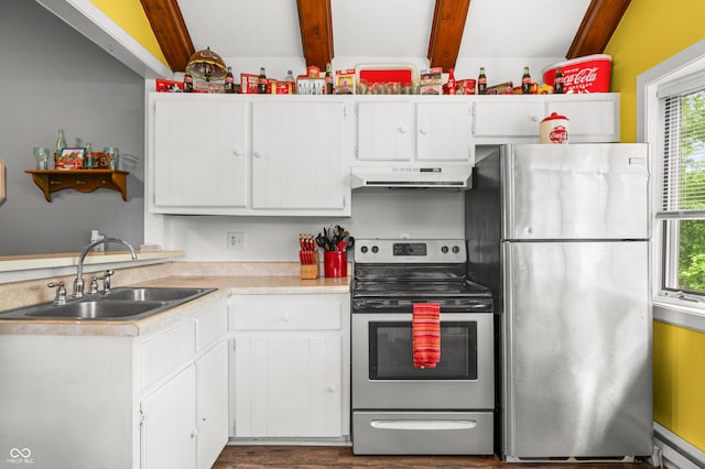 379 N Marion St, Morgantown, IN 46160 - kitchen featuring appliances with stainless steel finishes, under cabinet range hood, a sink, beamed ceiling, and light countertops