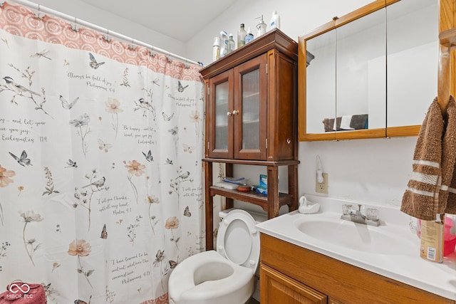 1116 N Berwick Ave, Indianapolis, IN 46222 - full bathroom featuring vanity, toilet, and a shower with curtain