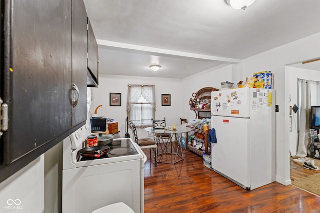 1116 N Berwick Ave, Indianapolis, IN 46222 - kitchen featuring white appliances, dark wood-type flooring, and dark countertops