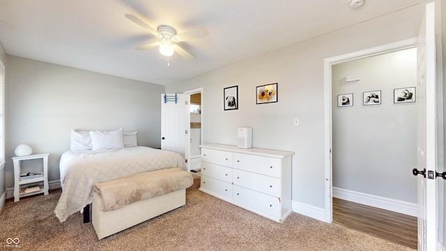 311 S 6th Ave, Beech Grove, IN 46107 - carpeted bedroom featuring baseboards and ceiling fan