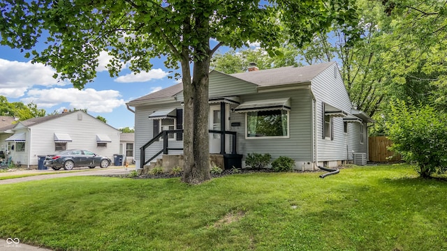 311 S 6th Ave, Beech Grove, IN 46107 - view of front facade with a chimney and cooling unit