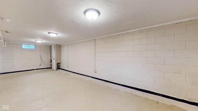 311 S 6th Ave, Beech Grove, IN 46107 - basement featuring a textured ceiling and concrete block wall