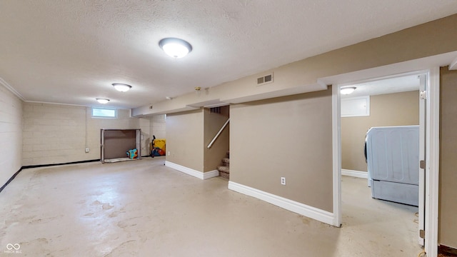 311 S 6th Ave, Beech Grove, IN 46107 - below grade area featuring washer / clothes dryer, baseboards, a textured ceiling, and stairs