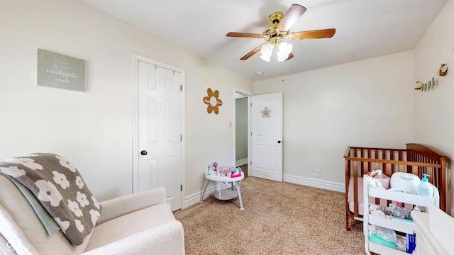 311 S 6th Ave, Beech Grove, IN 46107 - carpeted bedroom featuring baseboards and ceiling fan
