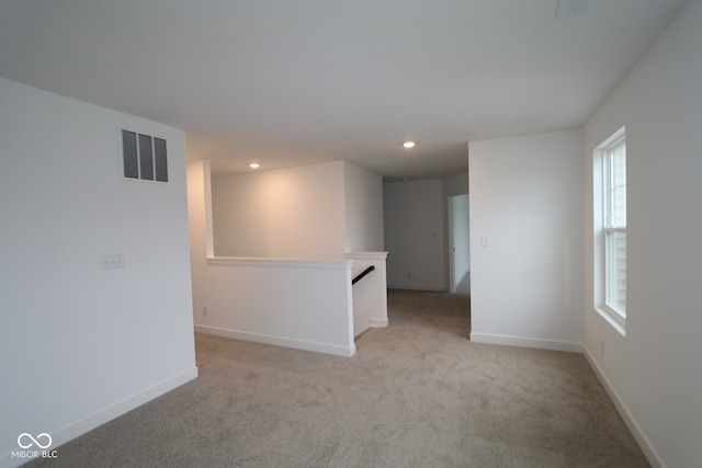 3917 Highcrest Rd, Indianapolis, IN 46239 - spare room with carpet floors, baseboards, and recessed lighting