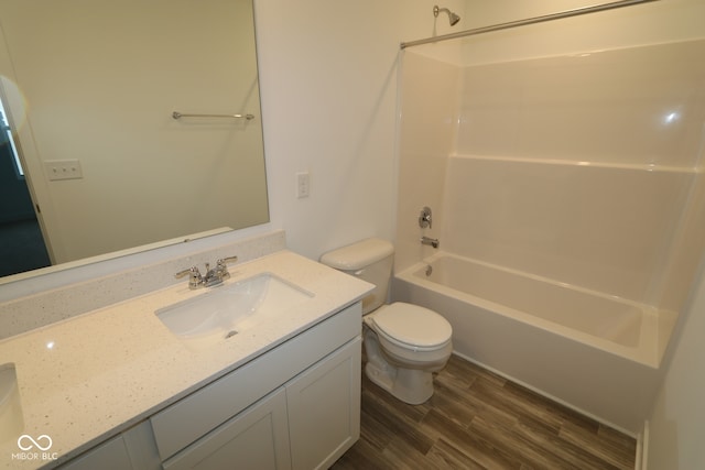 3917 Highcrest Rd, Indianapolis, IN 46239 - full bath with toilet, wood finished floors,  shower combination, and vanity