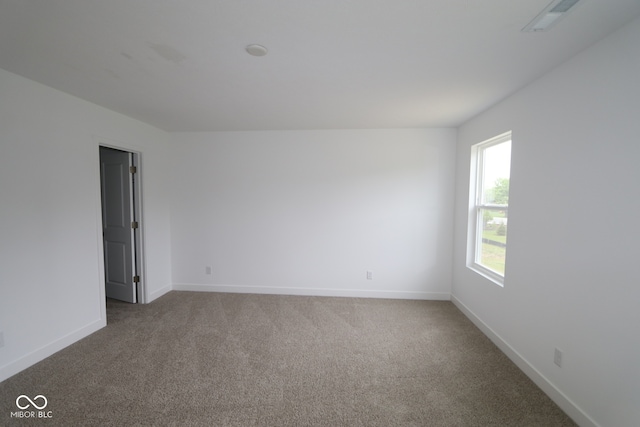 3917 Highcrest Rd, Indianapolis, IN 46239 - unfurnished room with carpet flooring and baseboards