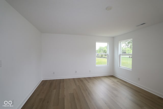 3917 Highcrest Rd, Indianapolis, IN 46239 - spare room with wood finished floors and baseboards