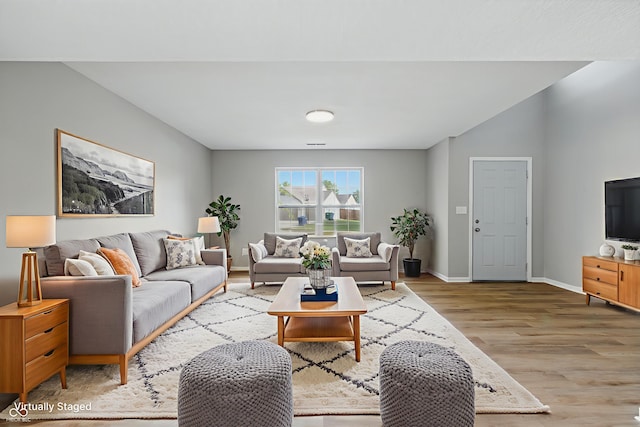 9949 Nightsong Ln, Avon, IN 46123 - living room with wood finished floors and baseboards