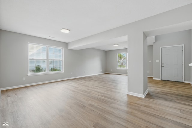 9949 Nightsong Ln, Avon, IN 46123 - spare room featuring light wood-type flooring and baseboards