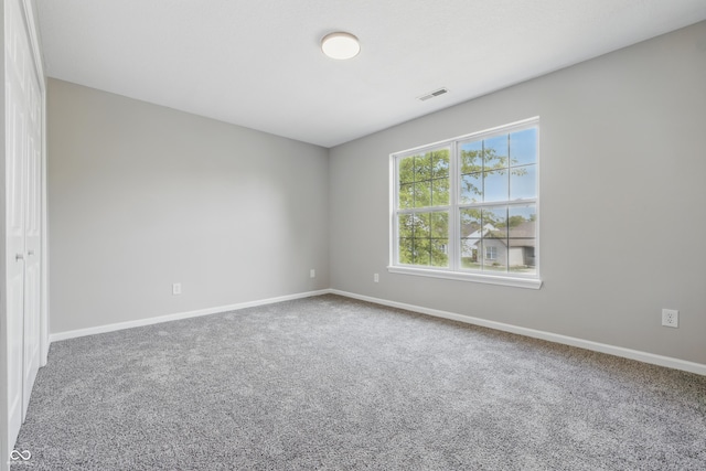 9949 Nightsong Ln, Avon, IN 46123 - empty room with carpet flooring and baseboards
