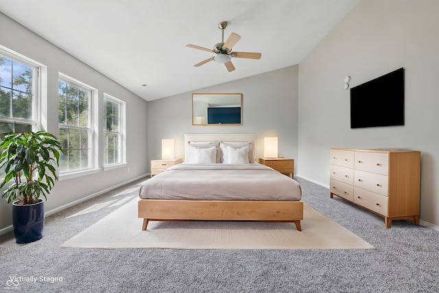 9949 Nightsong Ln, Avon, IN 46123 - carpeted bedroom featuring lofted ceiling, baseboards, and ceiling fan