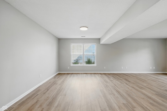 9949 Nightsong Ln, Avon, IN 46123 - spare room featuring light wood-type flooring and baseboards