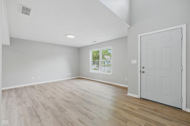 9949 Nightsong Ln, Avon, IN 46123 - entryway with light wood-style floors and baseboards