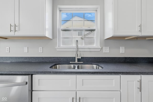 9949 Nightsong Ln, Avon, IN 46123 - kitchen with a sink, dishwasher, dark countertops, and white cabinets