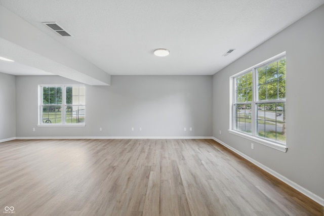 9949 Nightsong Ln, Avon, IN 46123 - empty room featuring light wood-type flooring and baseboards