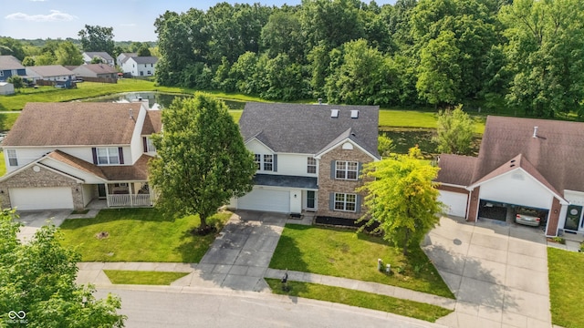 9949 Nightsong Ln, Avon, IN 46123 - aerial view of residential area with a nearby body of water