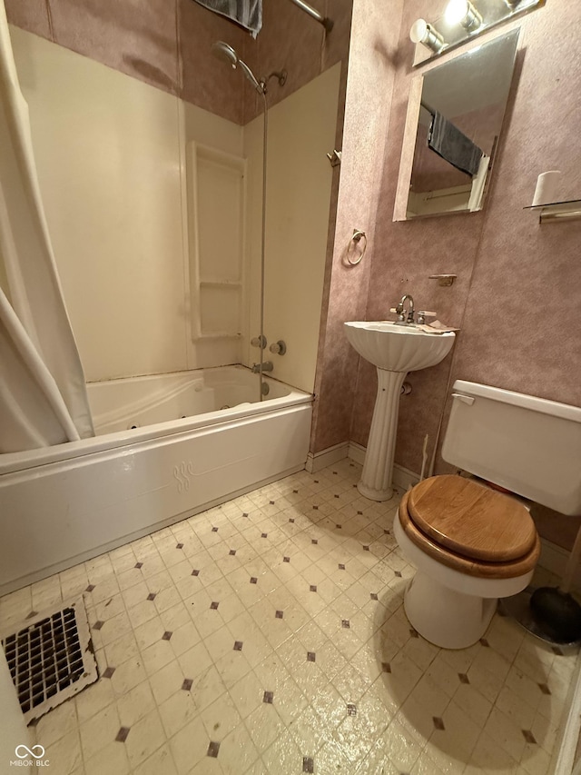 4931 Orion Ave, Indianapolis, IN 46201 - full bath with shower / bath combination with curtain, toilet, and tile patterned floors