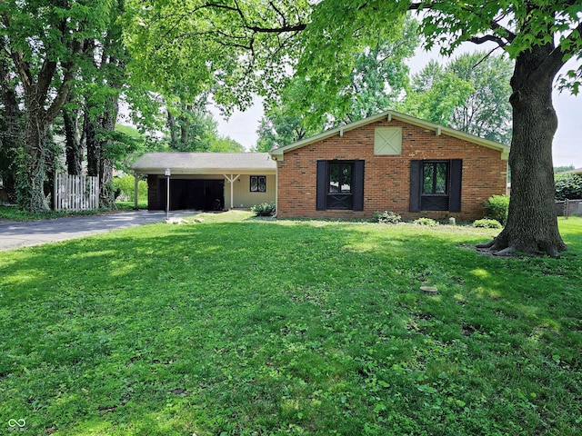 6801 Shalimar Ct, Indianapolis, IN 46214 - single story home featuring driveway, brick siding, and an attached carport
