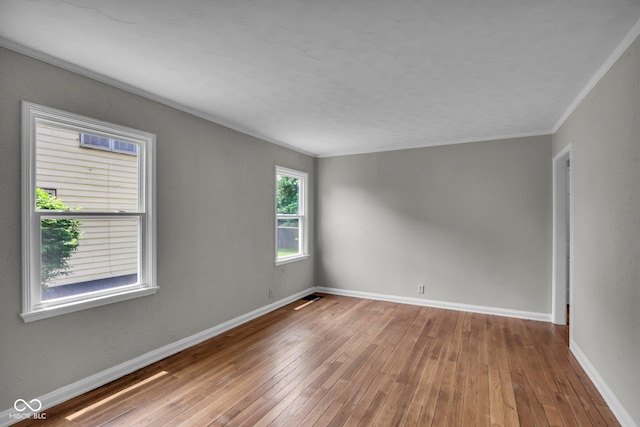 4708 Haverford Ave, Indianapolis, IN 46205 - empty room featuring hardwood / wood-style flooring and ornamental molding
