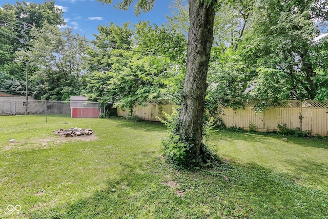 4708 Haverford Ave, Indianapolis, IN 46205 - fenced backyard with a storage unit