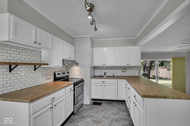4708 Haverford Ave, Indianapolis, IN 46205 - kitchen featuring stainless steel range with electric stovetop, butcher block countertops, under cabinet range hood, a peninsula, and light tile patterned flooring